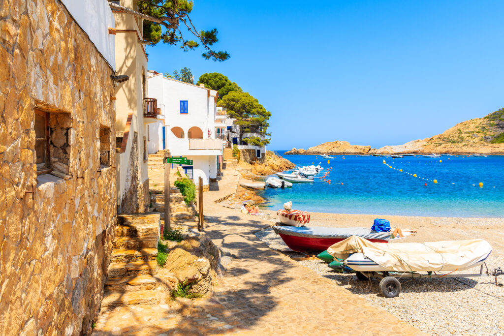 Fishing Boats On Beach In Sa Tuna Village With Colorful Houses O