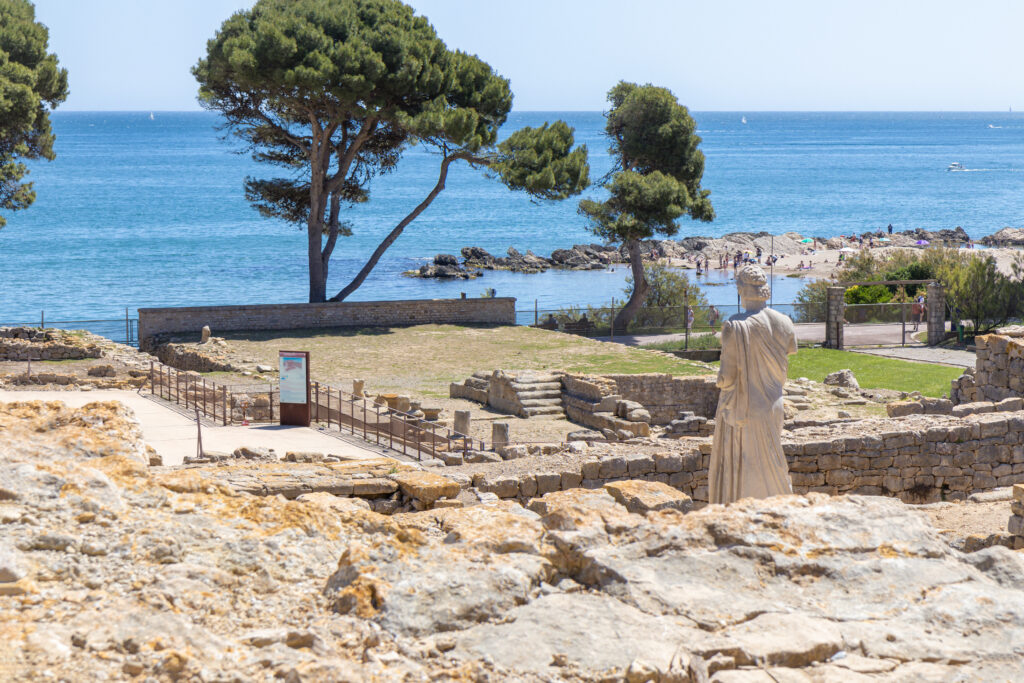 Archaeological Remains Of Ancient City Empuries With Reproductio